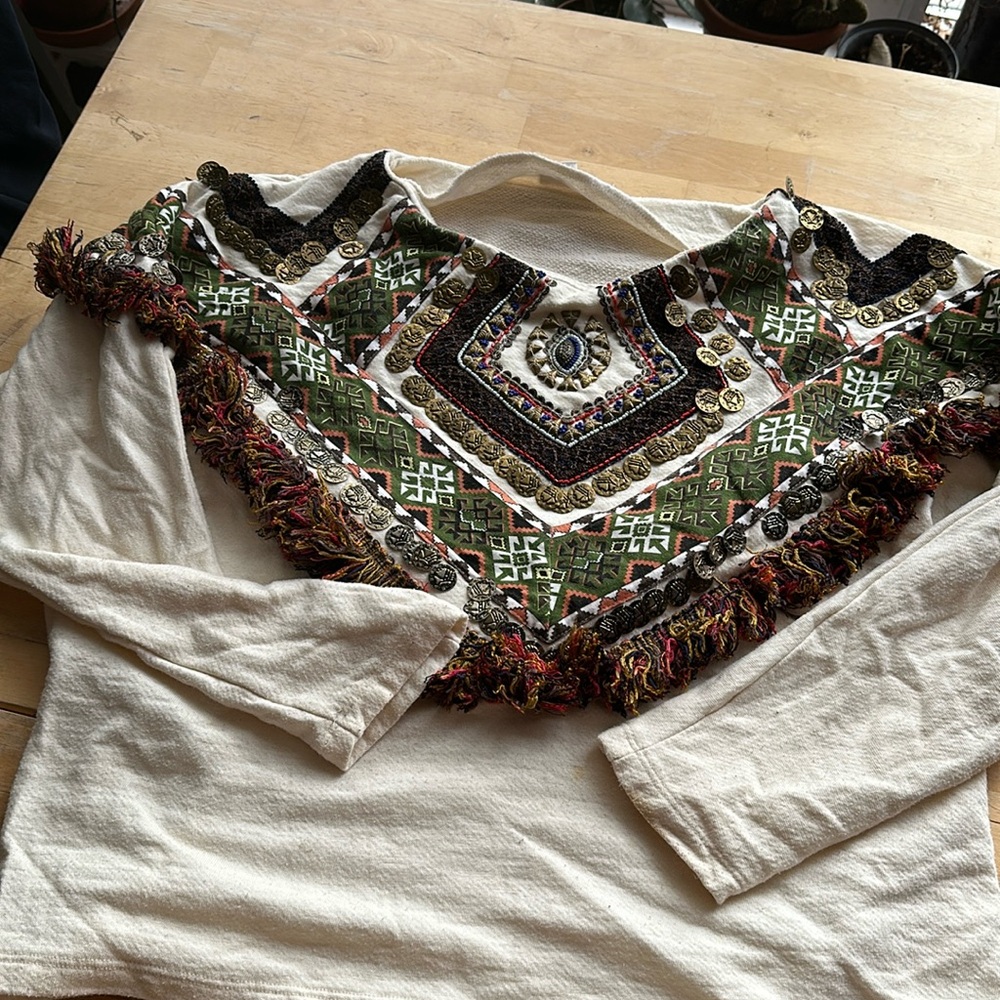 Colourful sweater with coins and beads